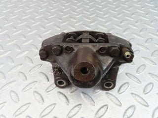 W124 Coupe rear left brake caliper used OEM