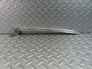 W123 rear left chrome window channel used OEM