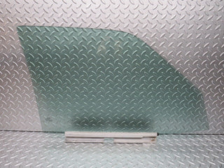 W124 Wagon front left door window glass used OEM