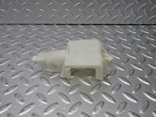 W124 Wagon rear door lock vacuum actuator cover used OEM