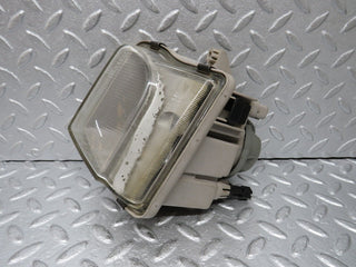 R129 SL front left fog light used OEM