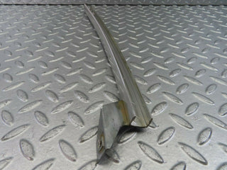 W123 rear left chrome window channel used OEM