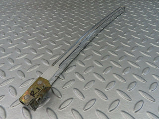 W116 rear left chrome window channel used OEM