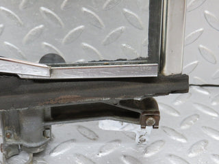 W108 front left quarter window used OEM