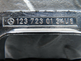 W123 left chrome door latch trim used OEM