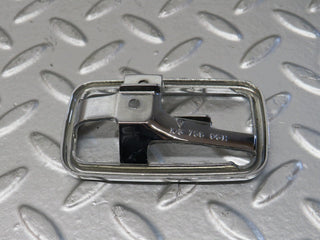 W123 chrome frame for door opener right used OEM
