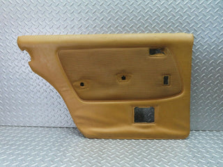 W123 rear left door card panel beige used OEM