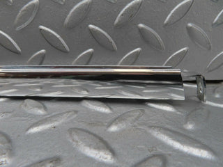 W123 rear left chrome window channel used OEM
