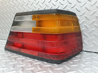 W124 tail light right side used OEM