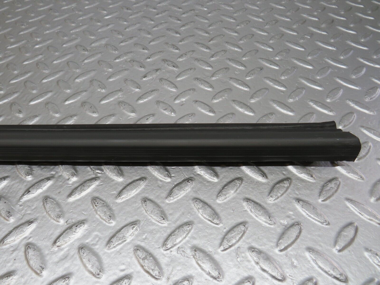 34220 Mercedes-Benz W124 260E Door Lower Sealing Rubber Trim Left