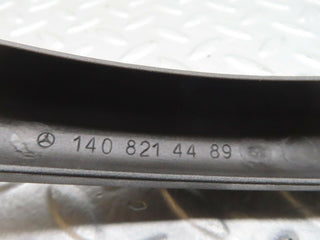 W140 boot hinge plastic cover right side used OEM