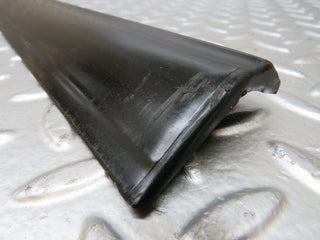 W123 front left door lower moulding trim used OEM