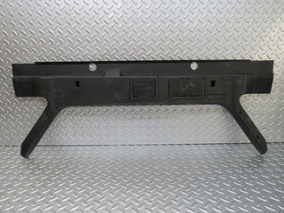 W124 trunk lock trim panel used OEM