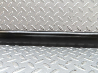 W123 front left door lower moulding trim used OEM