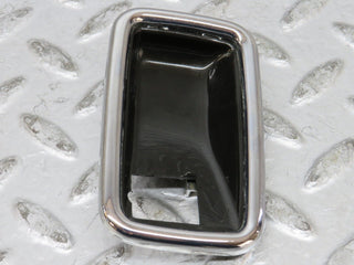 W123 chrome frame for door opener right used OEM