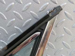 W109 front left quarter window glass used OEM
