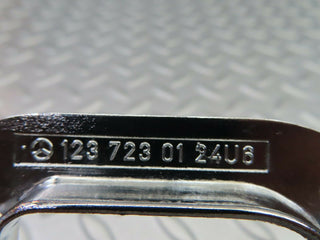 W123 left interior chrome door latch trim used OEM