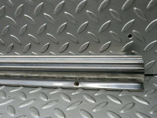 R107 SLC right door sill chrome used OEM