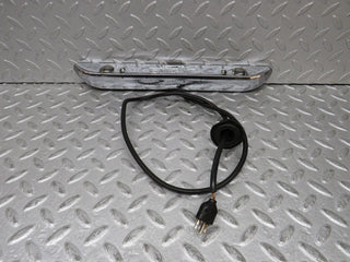 W109 number plate light trunk chrome used OEM