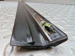 W123 front left door lower moulding trim used OEM