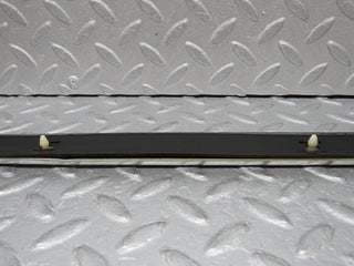 W109 left skirt chrome trim strip used OEM