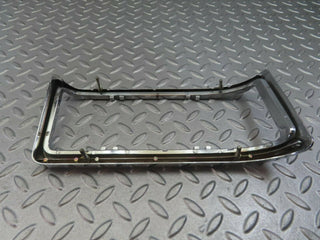 W115 tail light chrome frame left used OEM
