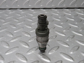 W124 Cabriolet fuel injector used OEM