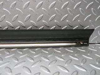 W123 front left door lower moulding trim used OEM