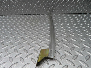 W123 rear left door chrome window channel used OEM