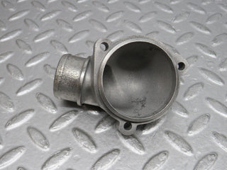 W124 Cabriolet thermostat housing used OEM