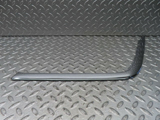 C140 front bumper trim left side used OEM