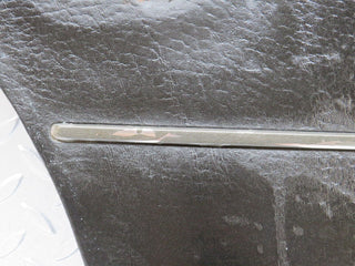 W108 rear left door card black used OEM