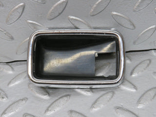 W123 chrome frame for door opener right used OEM