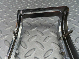 W115 tail light chrome frame left used OEM