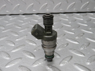 W124 Cabriolet fuel injector used OEM