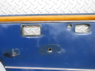 W109 rear left door card blue used OEM