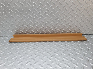 W124 rear left door sill trim palomino used OEM