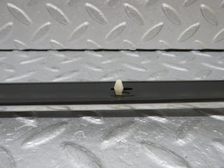 W109 left skirt chrome trim strip used OEM