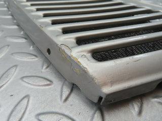 R107 SLC air intake grill left side used OEM