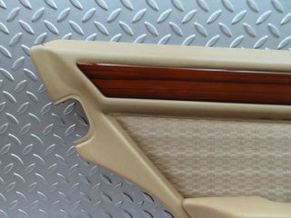 W124 rear left door card beige used OEM