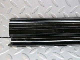 W123 rear right door sill trim black used OEM