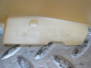 W124 Coupe left door lock mechanism cover used OEM