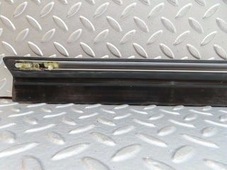 W123 front right door lower moulding trim used OEM
