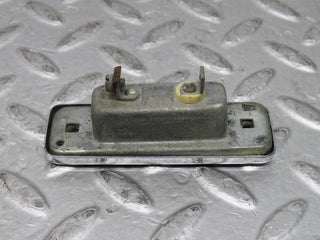 W109 number plate light chrome used OEM
