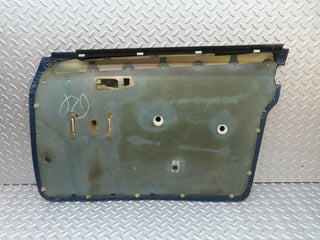 W123 front left door card blue used OEM