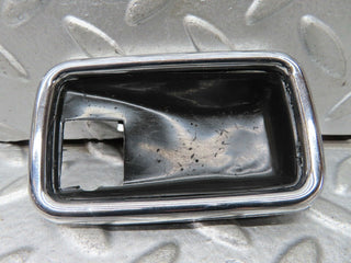 W123 chrome frame for door opener left used OEM