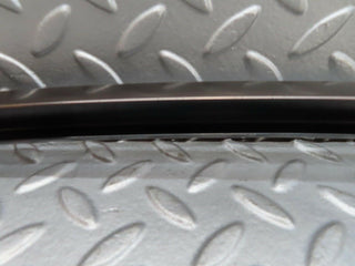 W124 rear left door upper window channel used OEM