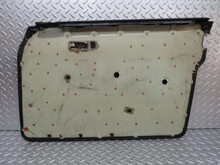 W123 Wagon front left door card black used OEM