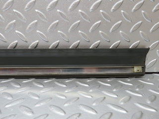 W201 Baby Benz front left door lower moulding trim used OEM