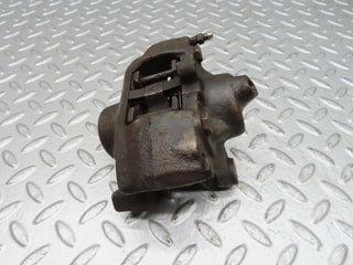 W140 rear left brake caliper used OEM